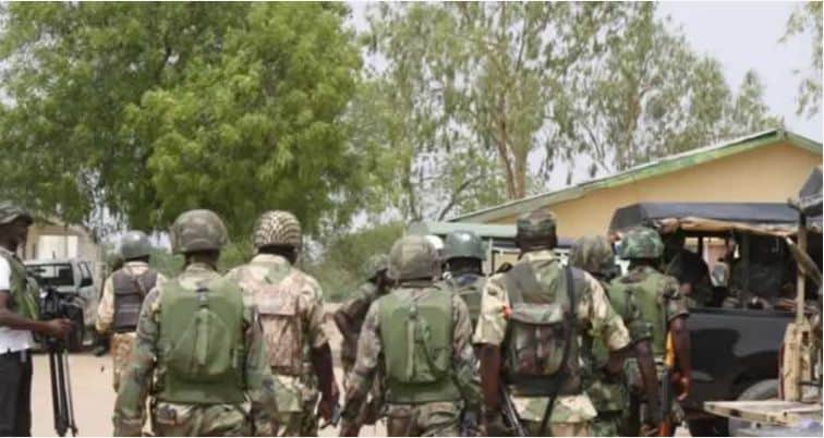Drama As Soldiers Prevent EFCC Operatives From Taking Over NSA Director's House