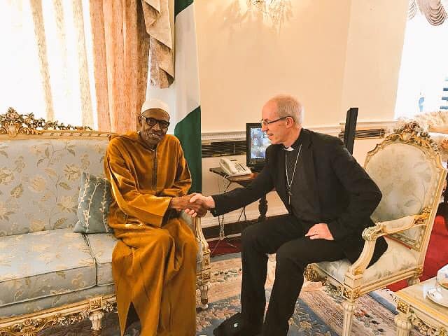Buhari exchanging pleasantries with  Most Revd Justin Welby