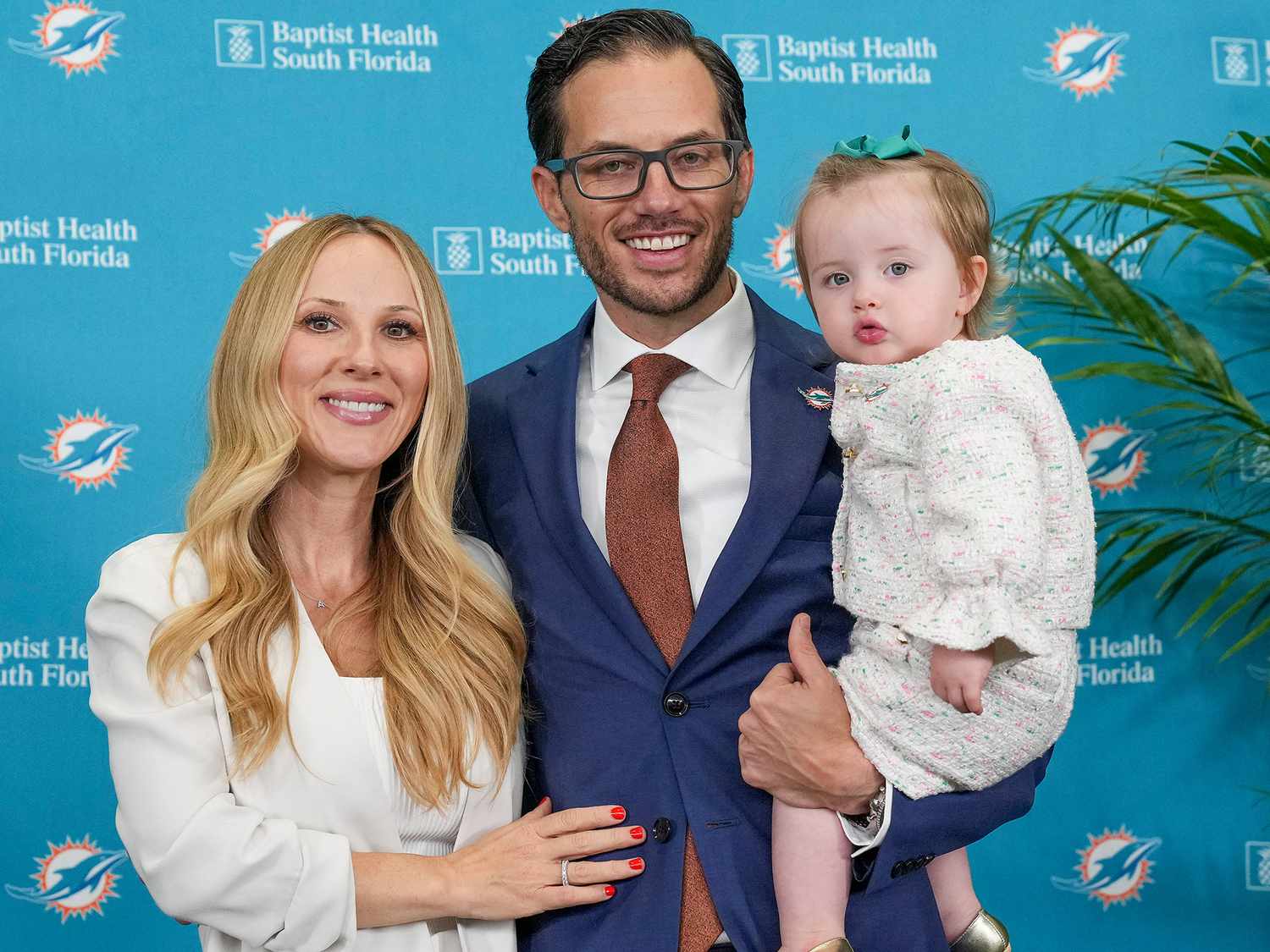 Mike McDaniel with his wife Katie and daughter Alya June.