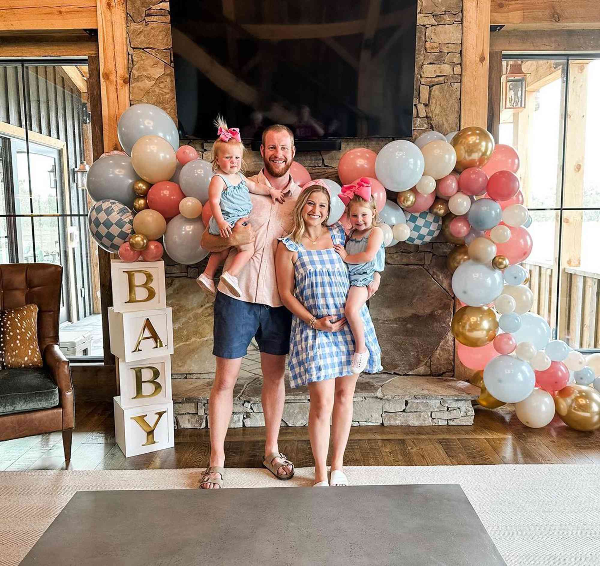 Carson Wentz and Madison Oberg with their kids