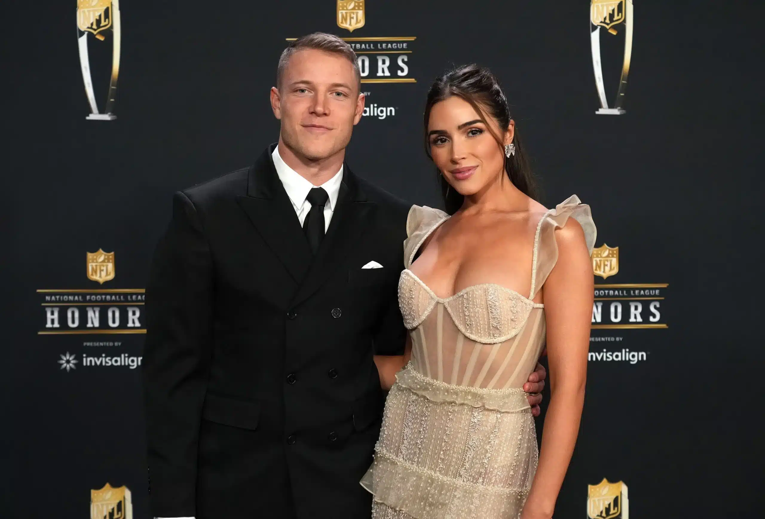 Olivia Culpo and Christian McCaffrey.