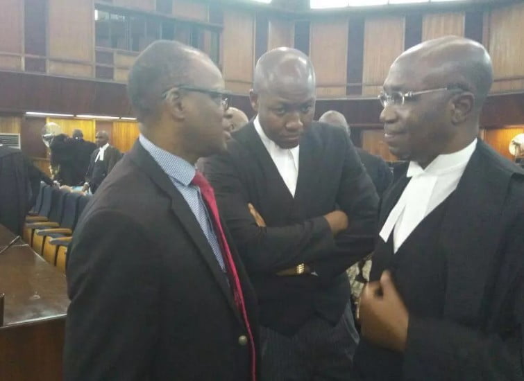 Factional PDP candidate Eyitayo Jegede in supreme courtroom with Dr. Bode Olanipekun SAN and his father, Chief Wole Olanipekun SAN on Tuesday, November 22