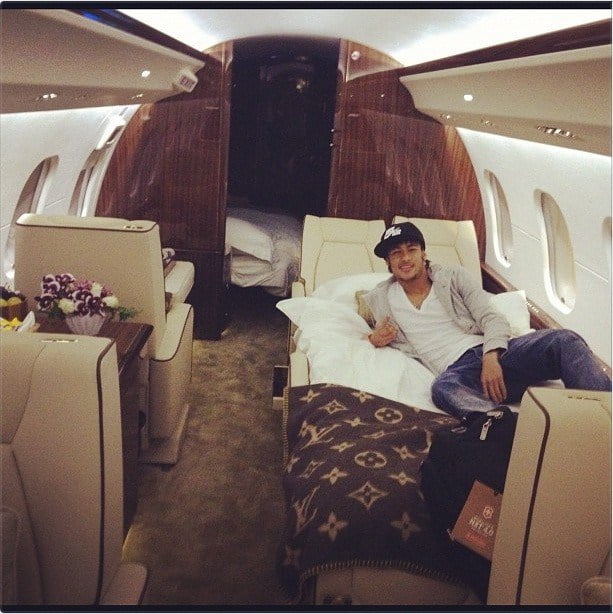  Neymar reclining inside his jet.