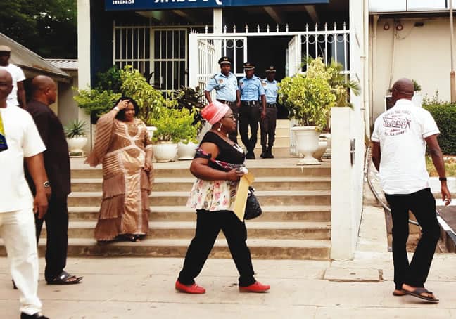 Patience Jonathan in front of the bank in Abuja