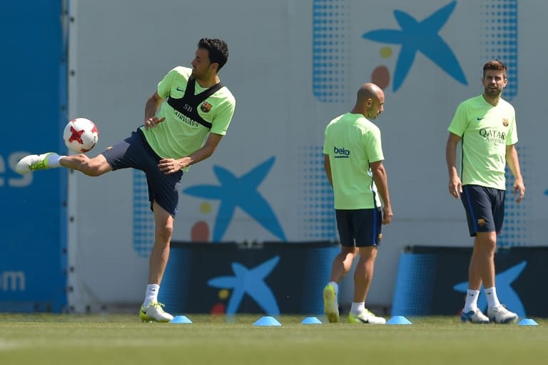 (From L) Barcelona's Sergio Busquets, Javier Mascherano and Gerard Pique take part in a training session in Sant Joan Despi on May 26, 2017, on the eve of their Spanish King's Cup final match against Deportivo Alaves