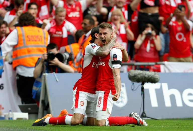 Nigeria News / Ian KINGTONChelsea's Diego Costa (C) tied the game with a second-half strike, but Arsenal's Aaron Ramsey replied within minutes with an FA Cup-winning header