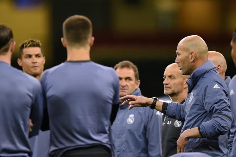 Nigeria News / Filippo MONTEFORTEReal Madrid's head coach Zinedine Zidane (R) instructs his players during a training session at The Principality Stadium in Cardiff, south Wales, on June 2, 2017, on the eve of their UEFA Champions League final match against Juventus