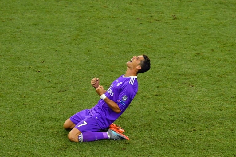 Real Madrid's striker Cristiano Ronaldo celebrates after winning the UEFA Champions League final on June 3, 2017