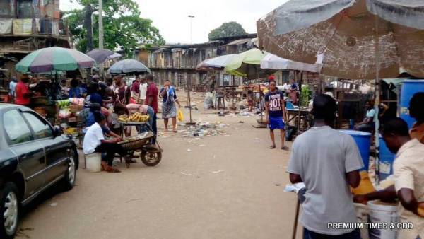 People buying and selling at Emejulue /Ajasa market, Onitsha