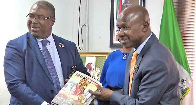 Executive Chairman of the FIRS, Babatunde Fowler, with EFCC Acting Chairman, Mr Ibrahim Magu, at the EFCC head office in Abuja