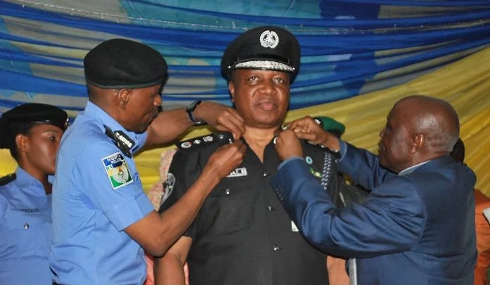 Police IG, Adamu Mohammed decorates DIG Ali
