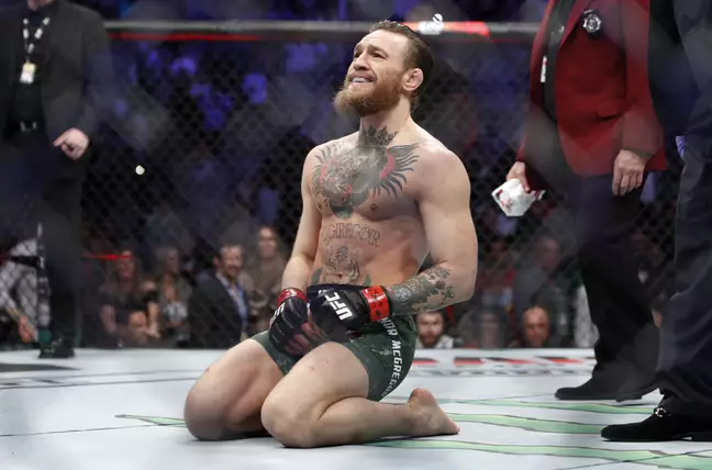 Conor McGregor sunk to his knees after his comeback win