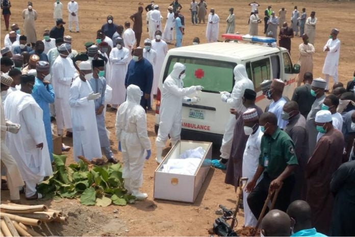 PHOTOS: How Nigerians Violated Social Distancing At Abba Kyari's Burial