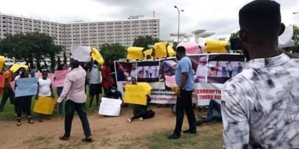 Bullion Van: Angry Nigerians Storm Abuja Street, Demand Bola Tinubu's Arrest (Photos)