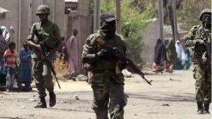 Nigeria troops on foot patrol. Jihadist groups like the Boko haram remain a huge threat to Nigeria's security. PHOTO/FILE/AFP.