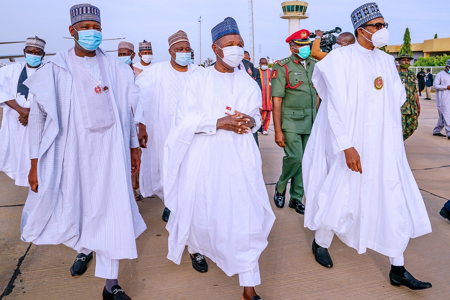 President Buhari with Governor Masari on his way to Daura from Katsina