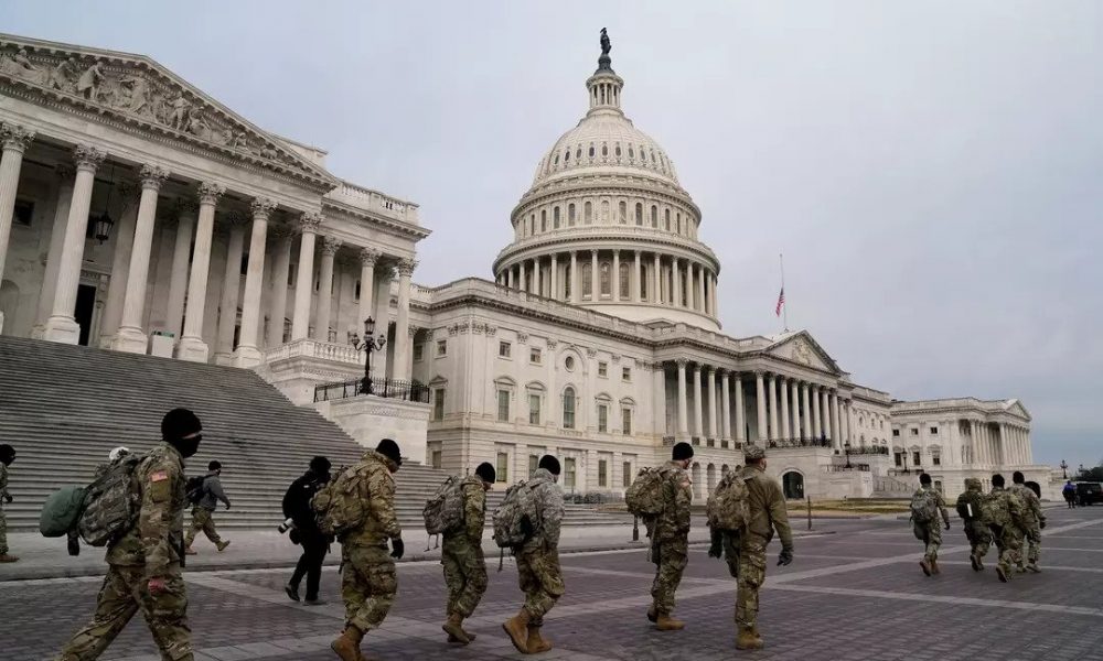Members of the National Guard arrive at the U.S. Capitol, January 11, 2021, days after supporters of U.S. President Donald Trump stormed the Capitol in Washington.