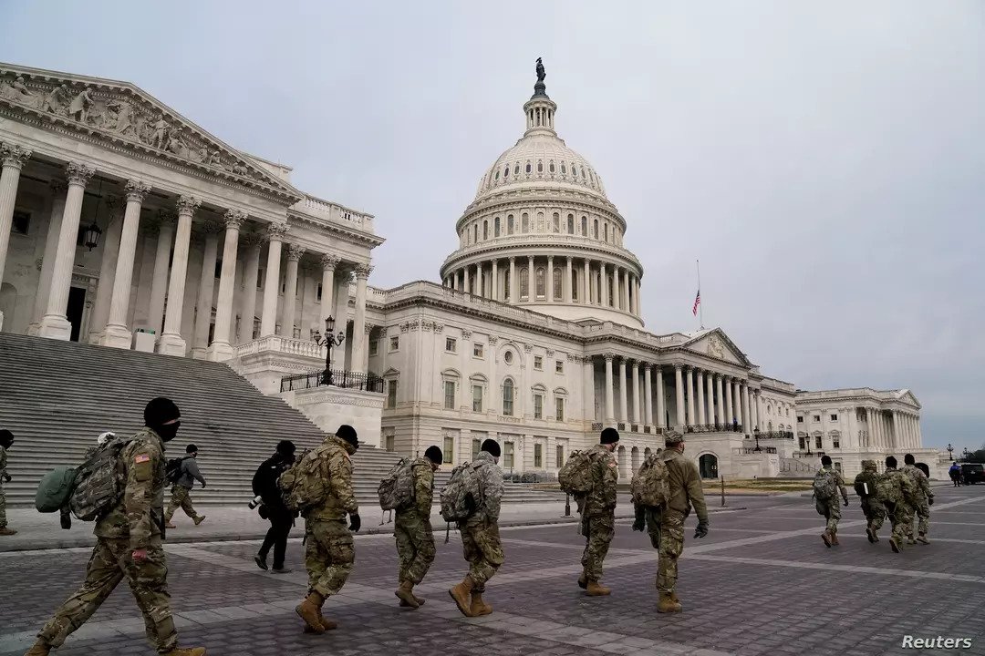 Members of the National Guard arrive at the U.S. Capitol, January 11, 2021, days after supporters of U.S. President Donald Trump stormed the Capitol in Washington.