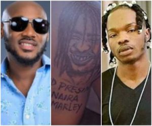 2Face Idibia Reacts As Die-Hard Female Fan Tattoos Naira Marley’s Face On Her Butt |Photos