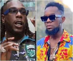 Watch The Moment Burna Boy Gave Patoranking A Huge Wad Of Money At His Birthday |Video