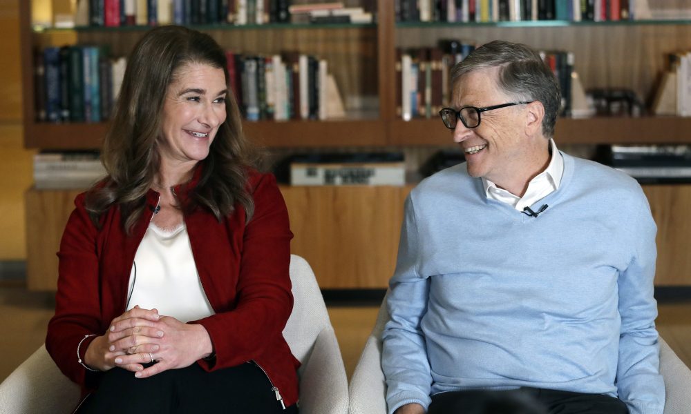 In this Feb. 1, 2019, file photo, Bill and Melinda Gates look toward each other and smile while being interviewed in Kirkland, Wash. Associated Press