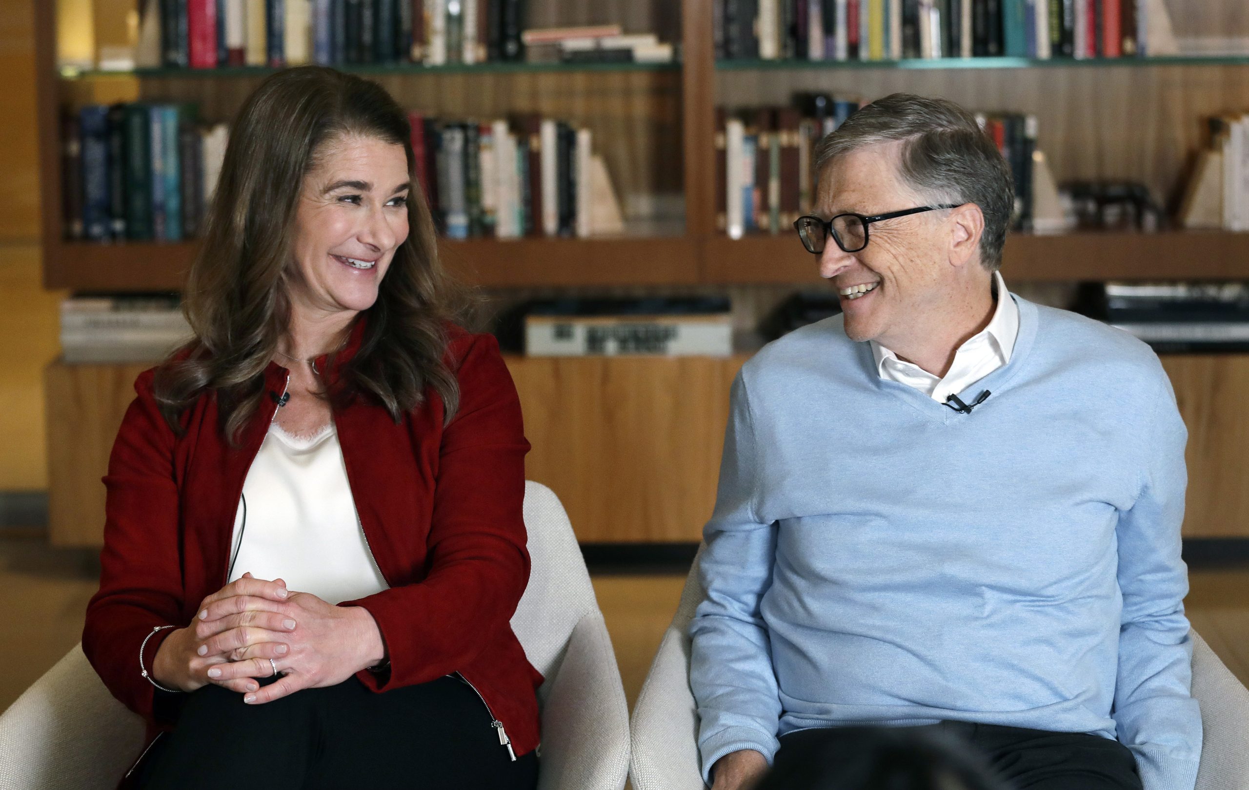 In this Feb. 1, 2019, file photo, Bill and Melinda Gates look toward each other and smile while being interviewed in Kirkland, Wash. Associated Press