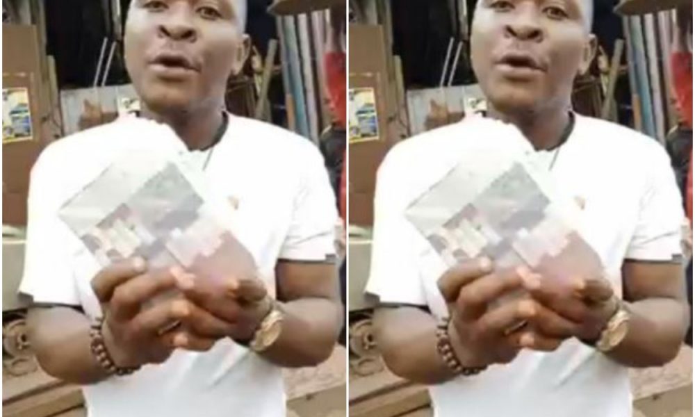 Man shows off 100k he picked at Obi Cuban's Mum's Burial