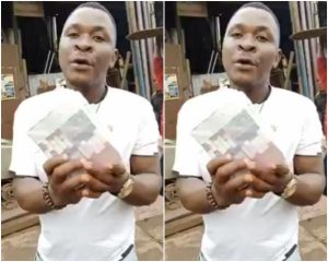 Man shows off 100k he picked at Obi Cuban's Mum's Burial