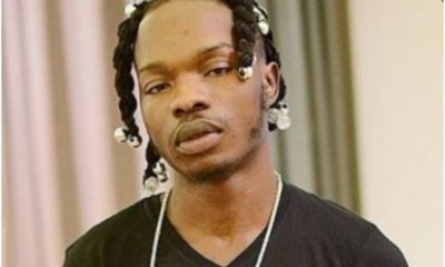 Naira Marley Under Fire For Using The Butt Of Fangirl To Deliver A Dare