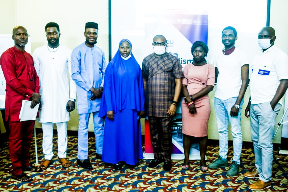 Ripples Nigeria Editor-in-Chief, Samuel Ibemere (m) with some participants.