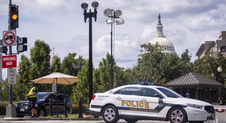 Police set up a security perimeter near the Library of Congress in Washington, Thursday, August 19, 2021.