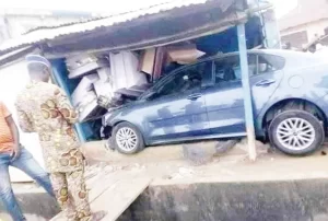 Couples 'Loses' ₦550,000 After Their Car Ram Into Coffin Shops In Lagos