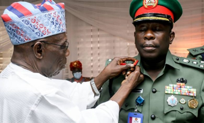 Nigerians React As Obasanjo Decorates Son With New Rank