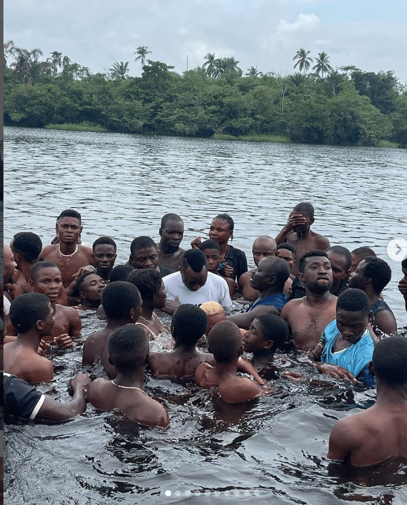 Nigerian presidential aspirant Omoyele Sowore causes stir as he holds political rally inside lake [Photos]