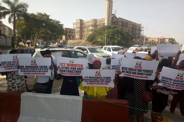 BREAKING: Gridlock As COVID-19 Contractors Protest In Abuja