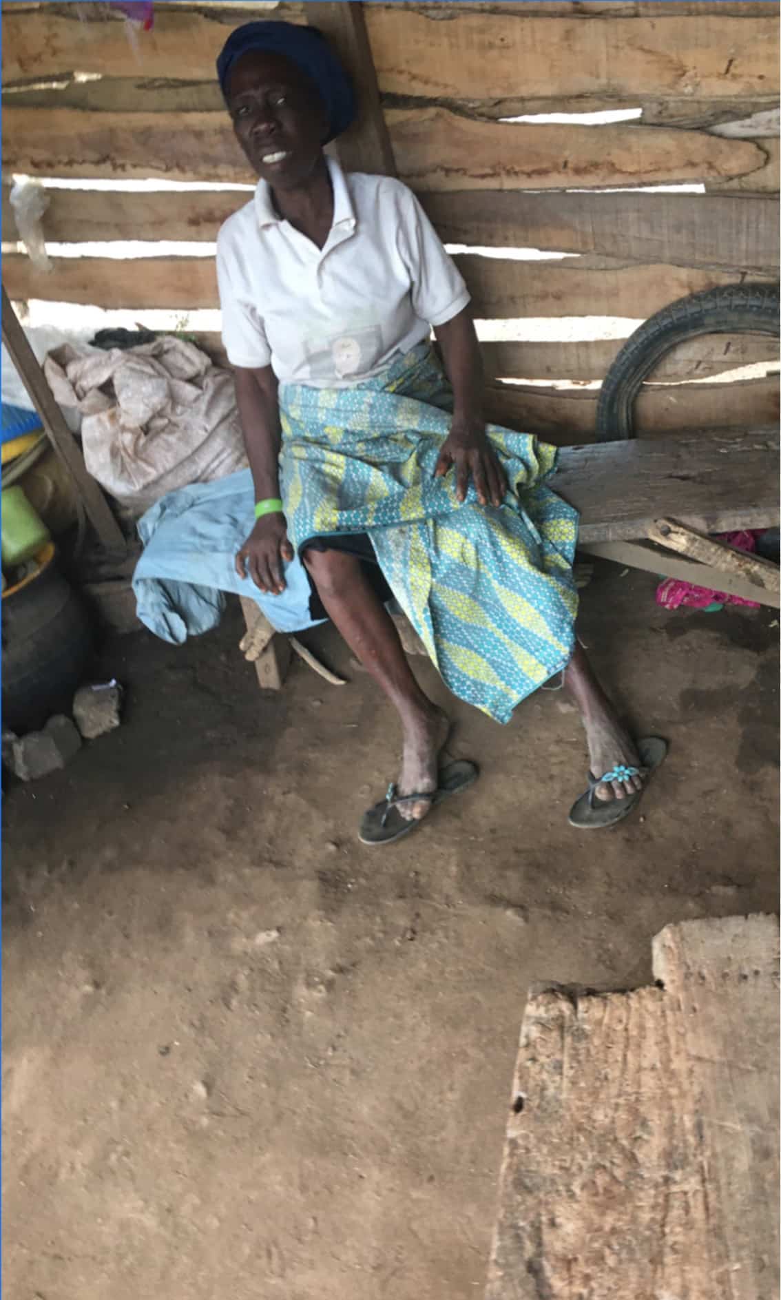 Mrs Agunbiade, 70yrs, in her wooden shop at the entrance/exit of Ijebu-Igbo community. Photo credit: Adesola Ikulajolu