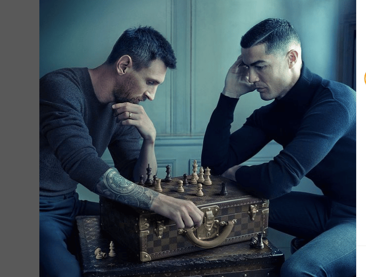 Cristiano Ronaldo and Lionel Messi Taking Photo playing chess in the a