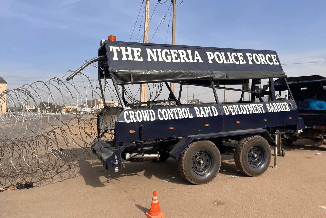 Photos: Security Operatives Barricade Roads To INEC Headquarters In Kano
