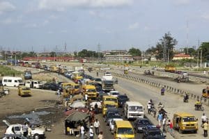 Panic As Man Walks On Rope Across Train Tracks In Lagos [Video}