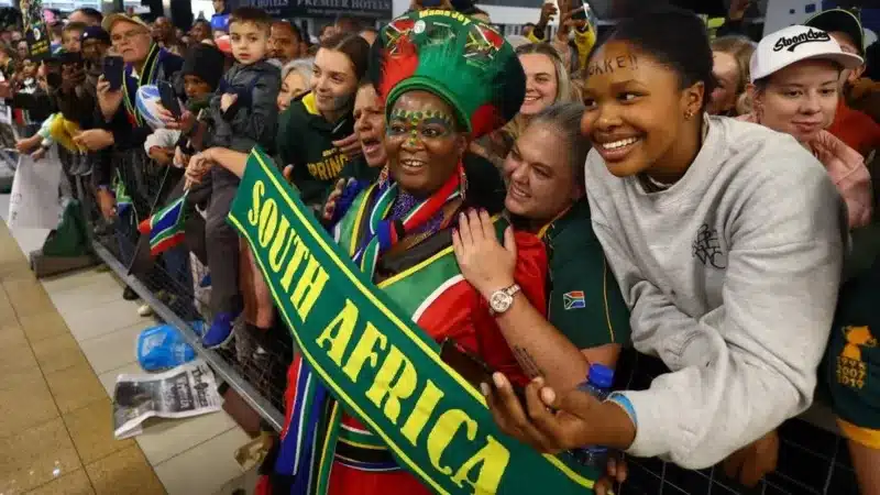 The rugby union team from South Africa has returned home from France following their historic fourth World Cup victory.