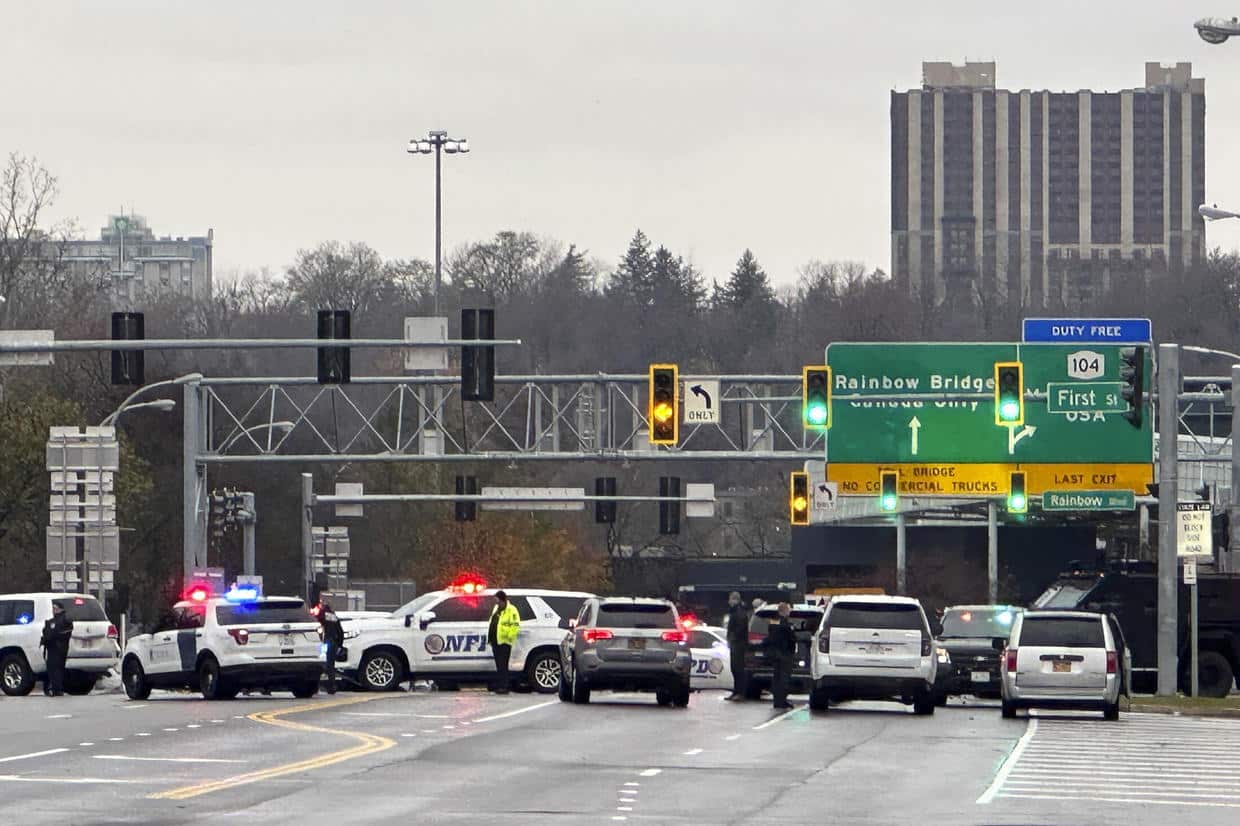 Law enforcement personnel block off the entrance to the Rainbow Bridge border crossing following a vehicle explosion on Nov. 22, 2023, in Niagara Falls, N.Y.
