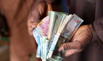 Tinubu, Dangote Receive Accolades As Ex-Presidential Aide Reacts To Dollar To Naira Exchange Rate