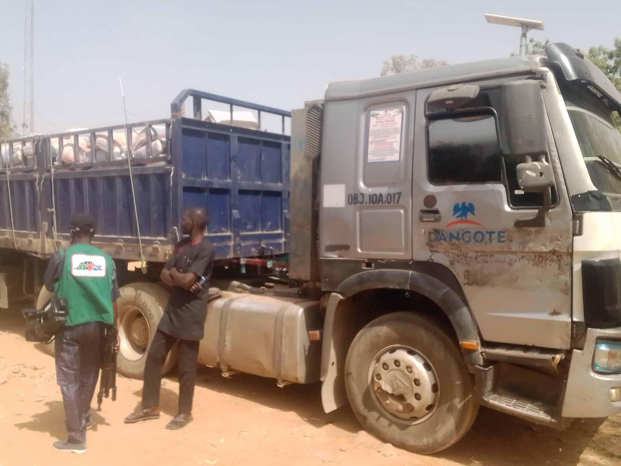 BREAKING: Army Intercepts Dangote Trucks Allegedly Transporting 'Prohibited Goods' To Cameroon