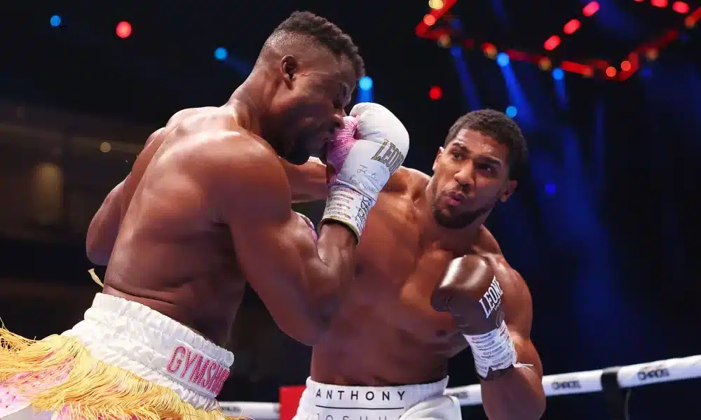 Anthony Joshua lands a right hand on Francis Ngannou. Photograph: Richard Pelham/Getty Images