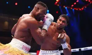 Anthony Joshua lands a right hand on Francis Ngannou. Photograph: Richard Pelham/Getty Images