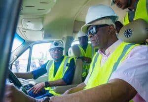 The minister of Finance, Wale Edun with the founder and chairman, Chidi Ajaere during the visit to JET Motor Company Assembly Plant on Friday.