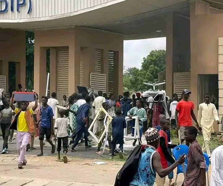 'Millions Of Naira Down The Drain', FG Cries As Protesters Down NCC In Kano