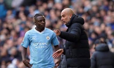 Jeremy Doku and Pep Guardiola