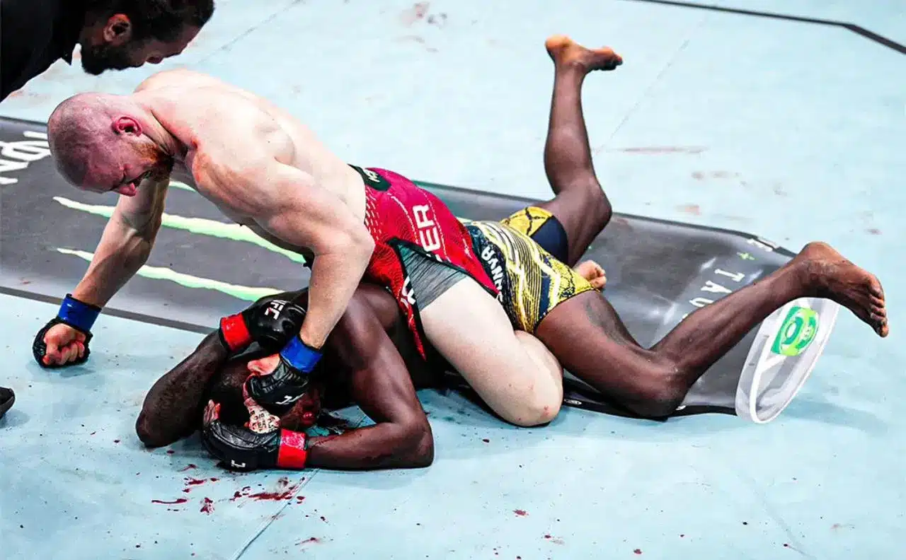 Joe Pyfer pounding on Israel Adesanya earlier today, March 29.