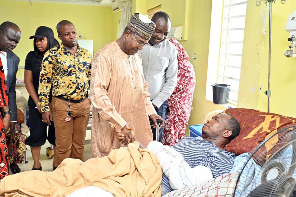 The Chairman and Chief Executive Officer of the National Drug Law Enforcement Agency (NDLEA), Mohamed Buba Marwa meeting with a wounded officer.